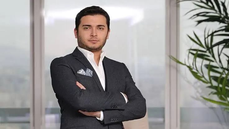 A professional portrait of Faruk Fatih Özer, the young CEO behind the $2 billion Thodex scam that defrauded 400,000 Turkish users.