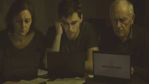 A worried family staring at laptops showing frozen accounts and ‘website not found’ messages, symbolizing victims of ICO fraud and financial loss.