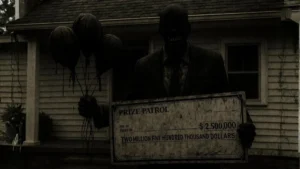 A terrifying figure impersonating the Prize Patrol holds a $2.5 million check and black balloons, illustrating the horror of prize scam imposters.